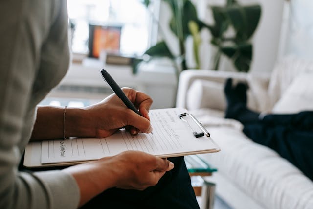 Photo by Alex Green: https://www.pexels.com/photo/crop-ethnic-psychologist-writing-on-clipboard-during-session-5699456/