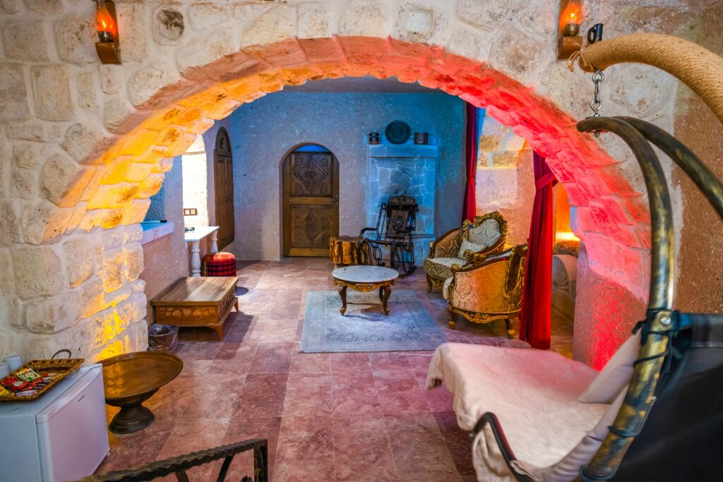 Photo by Sadi Gökpınar: https://www.pexels.com/photo/view-of-a-room-in-oread-cave-suites-urgup-turkey-19883620/